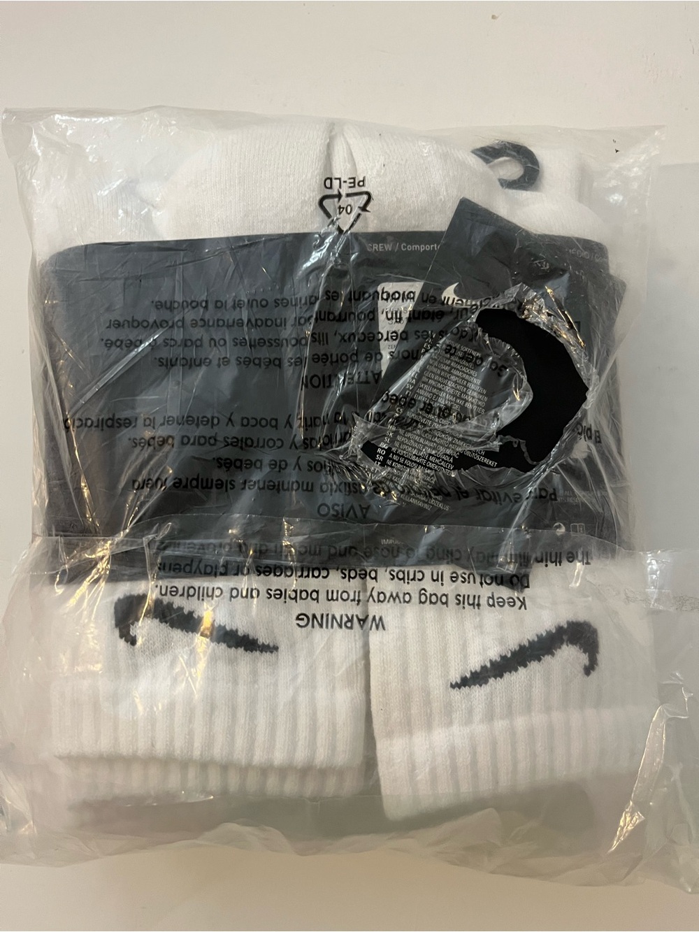 Nike White Crew Socks with Black Swoosh Pack